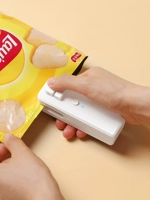 Японская мини -портативная герметичная машина Небольшое домашнее пластиковое пакетное пакетное герметичное закусочное закусочное уплотнительное устройство