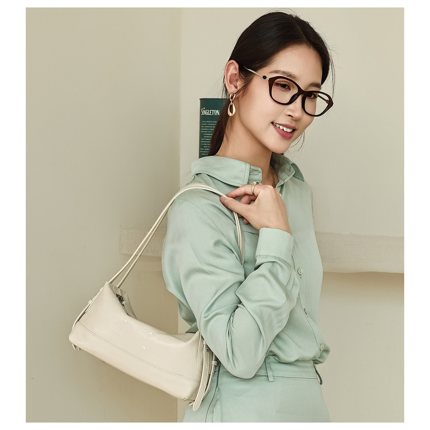 GXFMOD高级感法式牛皮法棍包女2026春夏新款轻奢气质单肩包斜挎包