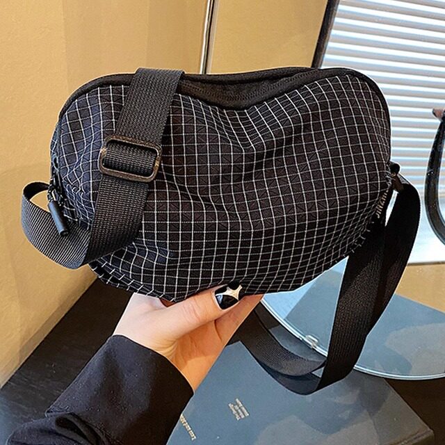 包包女2026新款潮流斜挎包女大容量帆布单肩包运动百搭饺子贝壳包