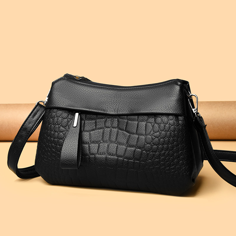 斜挎包2025新款时尚百搭小众设计真皮质感中年单肩女包多层大容量