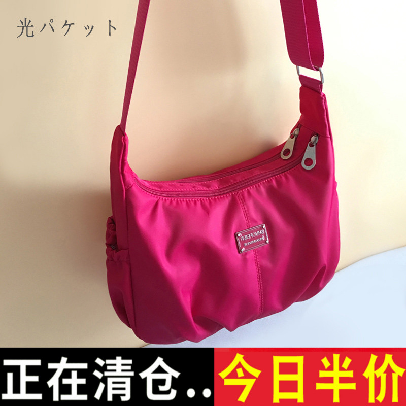 韩版斜挎包女2021新款饺子包休闲