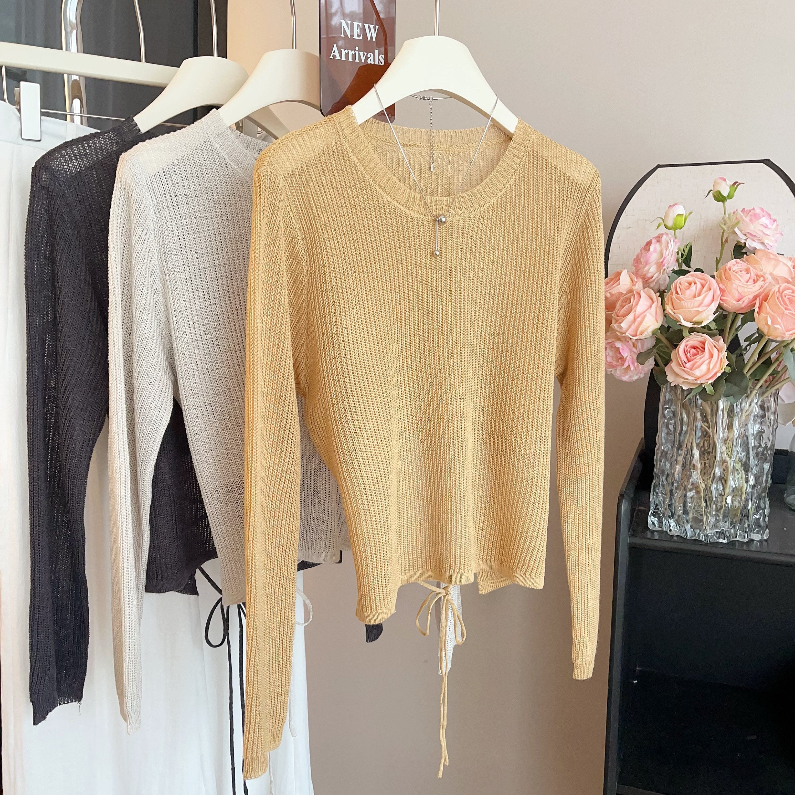 TG 2024秋季新款设计感后腰系带显瘦系带长袖宽松针织衫女上衣潮