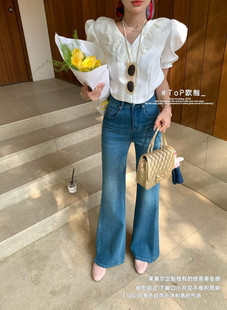 TOP春季2026新款韩版高腰显瘦莱赛尔四面弹小开叉简喇牛仔裤3100