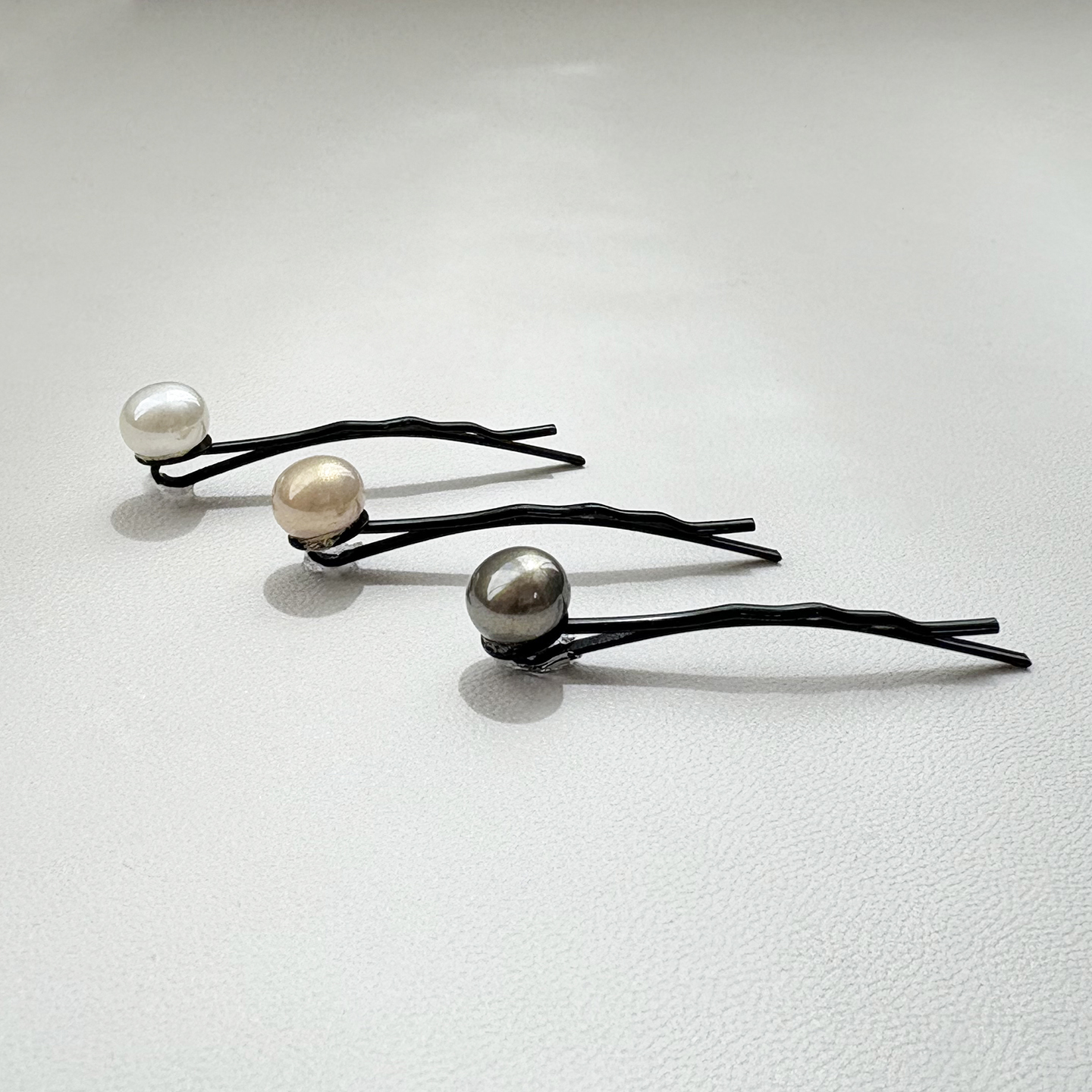 诗情画意仿珍珠弧形一字夹