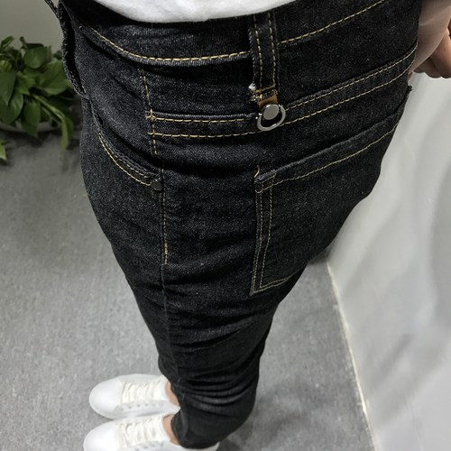 潮男新款黑黄社会小伙牛仔长裤