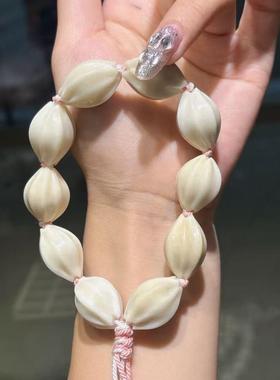 小红书爆款天然象牙果玉兰花手持天然文玩时尚配饰手炼手串饰品