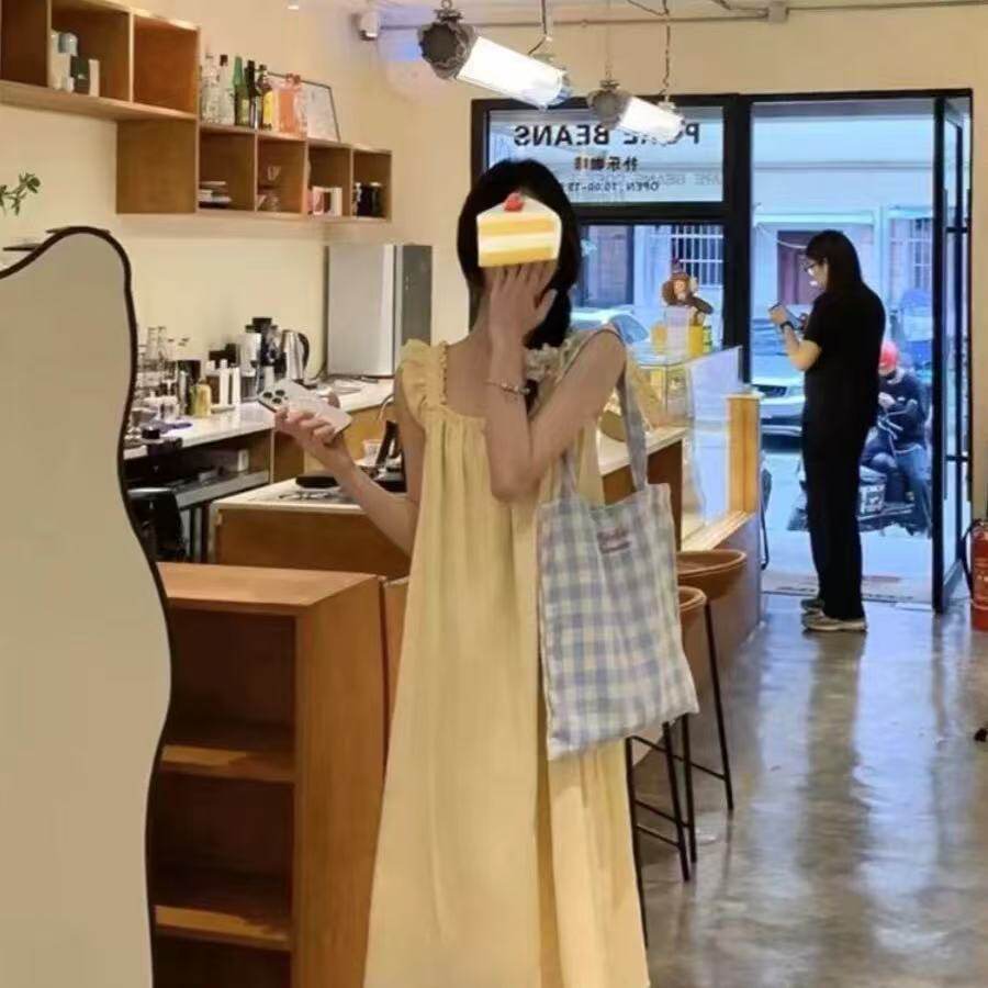 韩版新款小飞袖甜美减龄蝴蝶结黄色吊带连衣裙夏季A字宽松长裙女