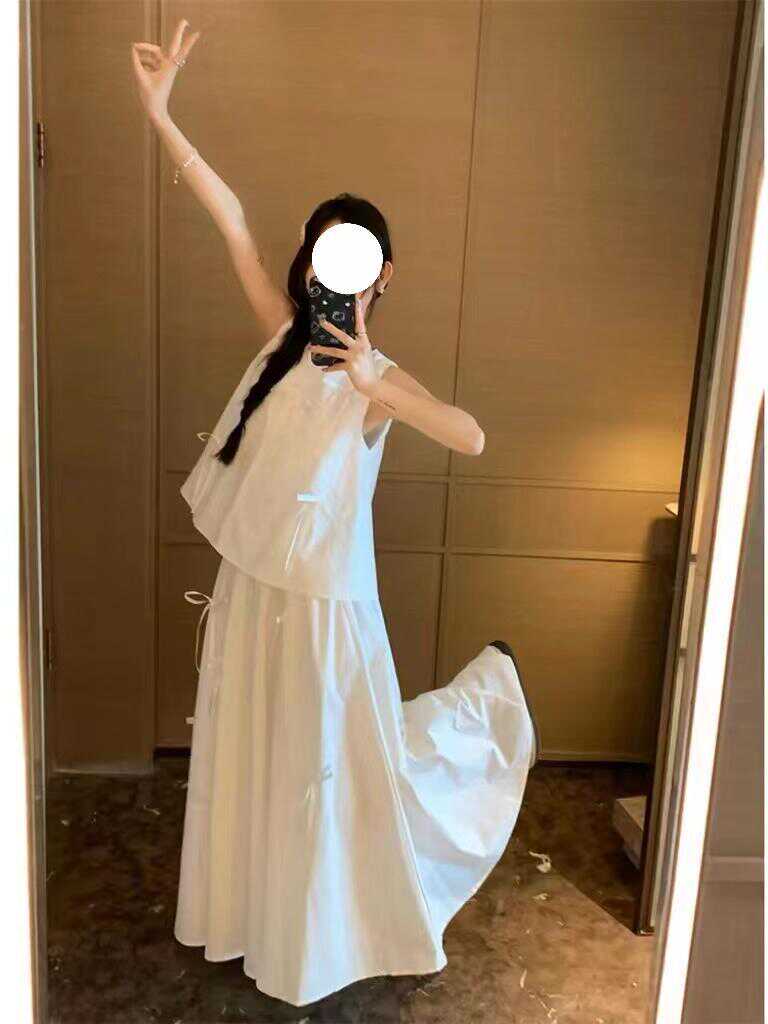 2024温柔甜美风套装夏季设计感蝴蝶结宽松白色无袖背心高腰半身裙
