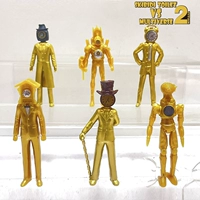 Часы, электродрель, золотой туалет, кукла