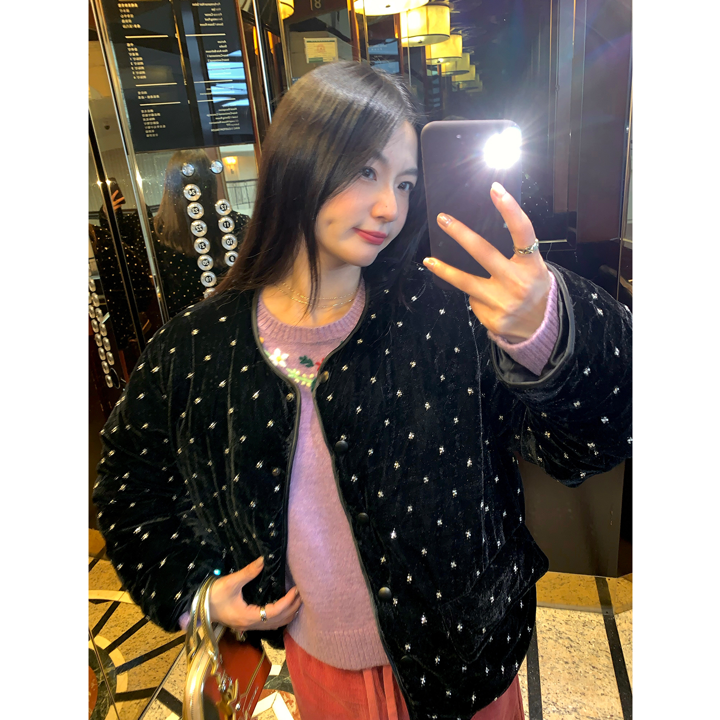 落落狷介黑色丝绒保暖羽绒服女