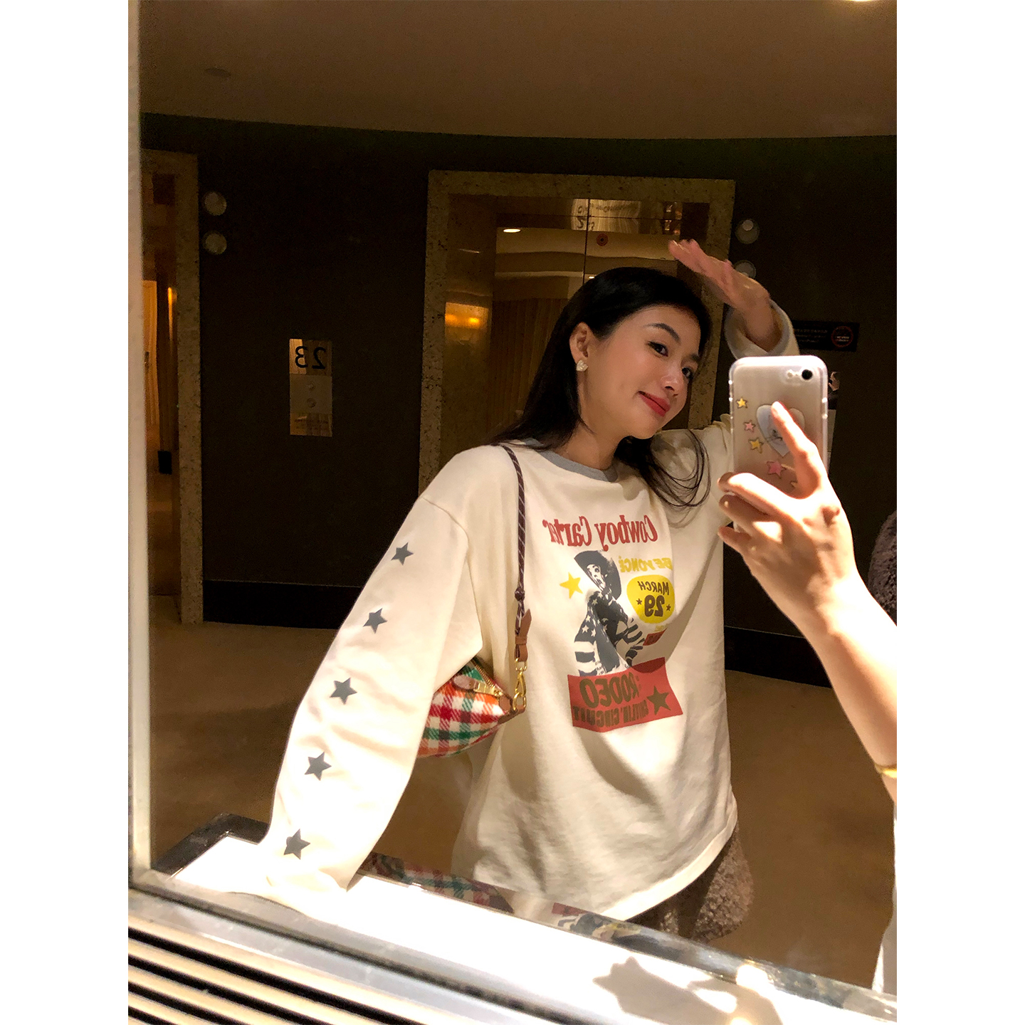 落落狷介宽松印花长袖T恤女