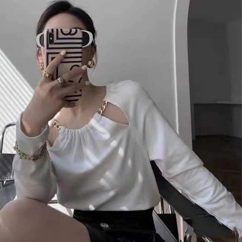 Long sleeve knitted women's spring new Korean version design sense small round collar hollow slim top fashion