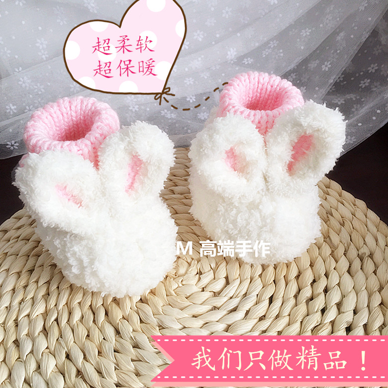 毛线冬季针织婴儿耳朵白色宝宝鞋图片