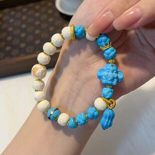 驼骨搭配菱镁矿象神多宝单圈手链 TY2211
