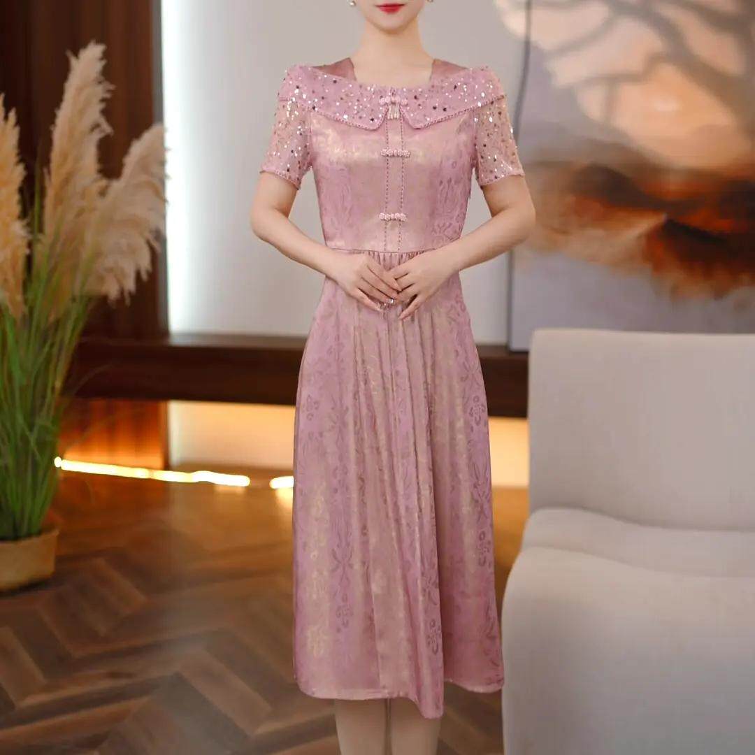 中年妈妈粉色亮片A字连衣裙