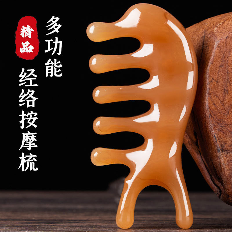 头皮按摩牛角梳头部经络疏通梳按