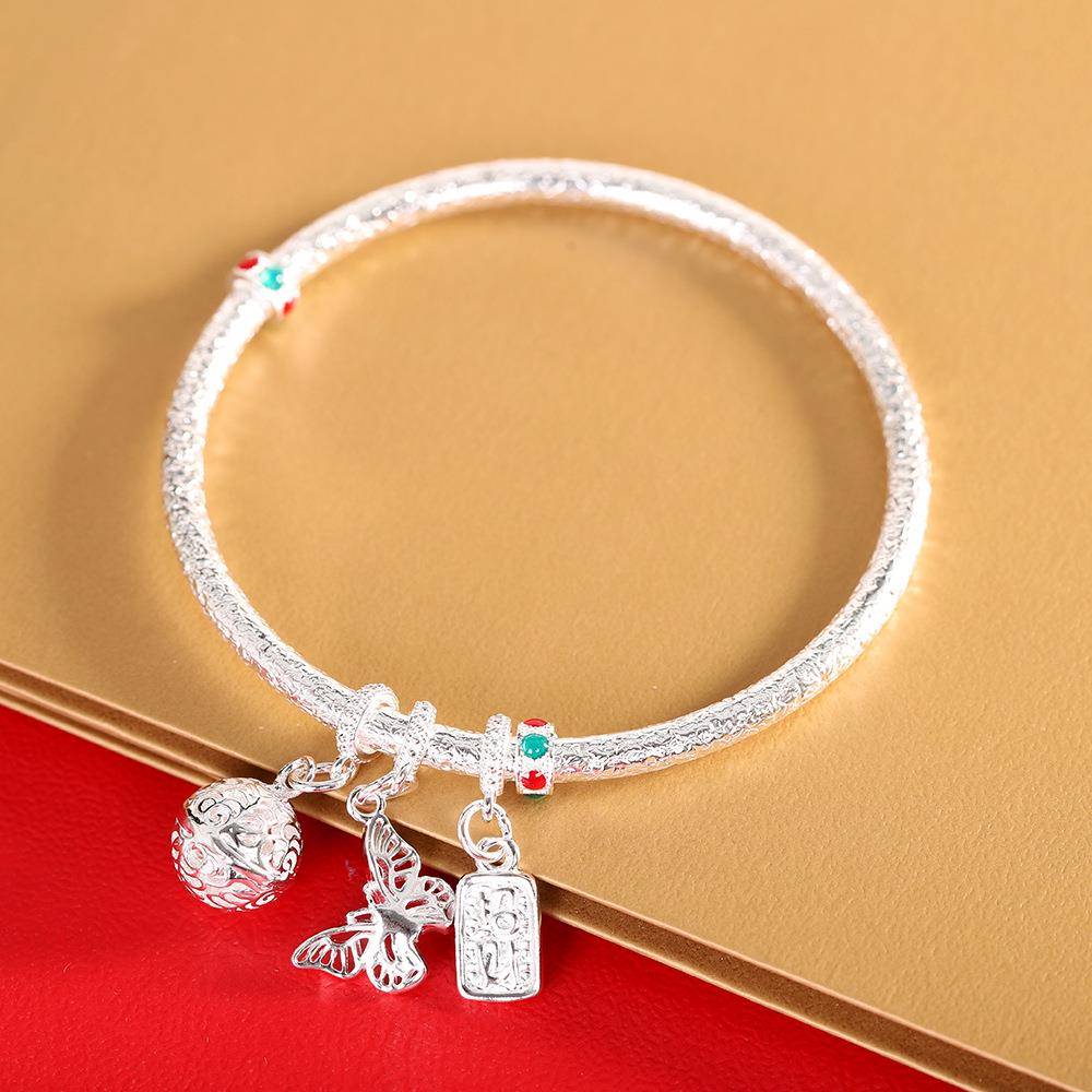 本命年银9不规则纹滴油吊蝴蝶宫铃吉言福实心闭口手镯礼物