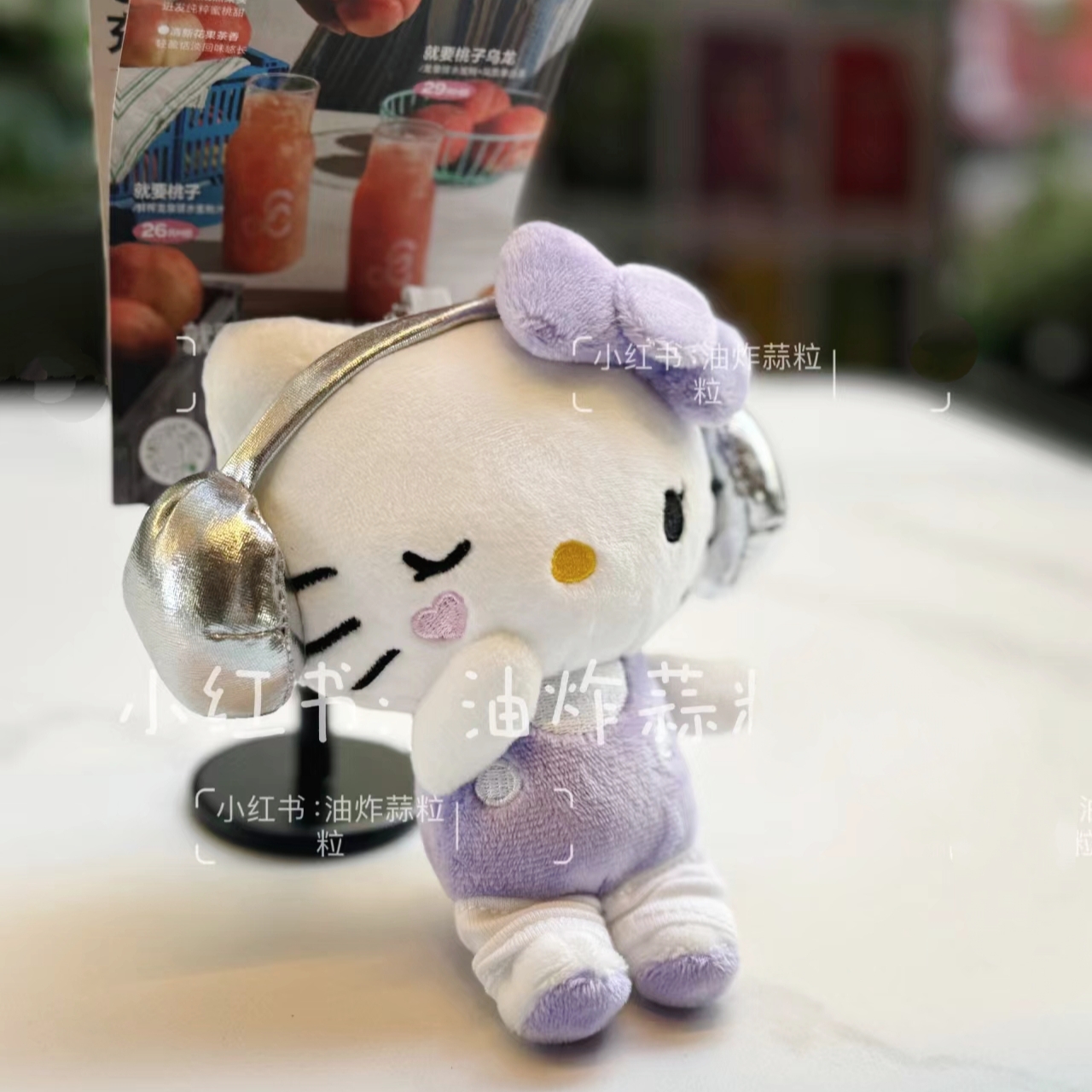 紫色耳麦凯蒂猫书包挂件