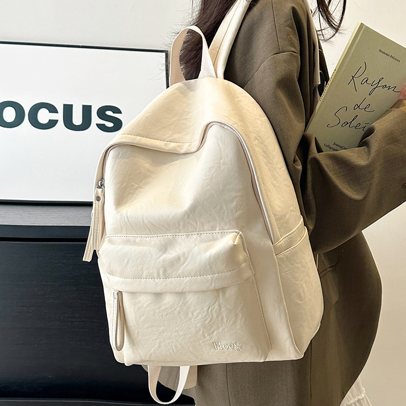 2025新款皮质防水双肩背包