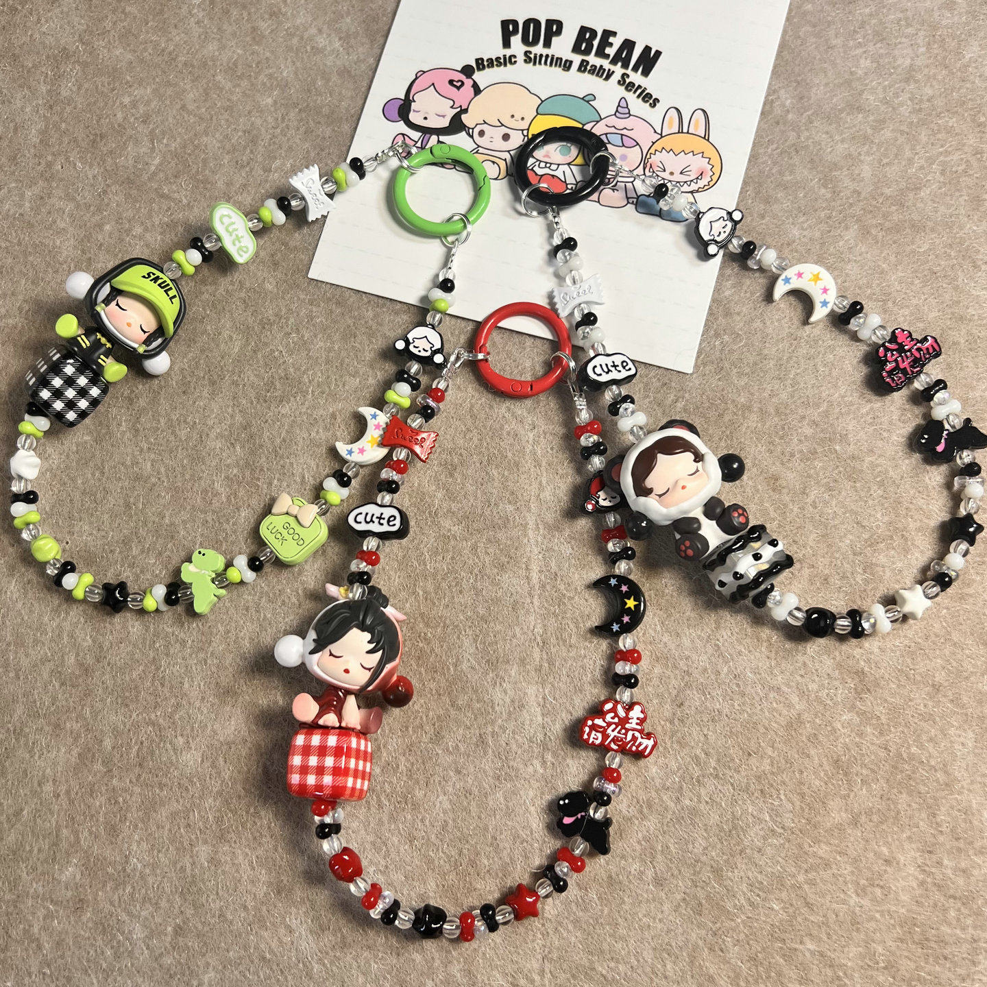 DIY礼物泡泡玛特SKULLPANDA萌粒合金手机链侧挂绳包挂手腕防丢链