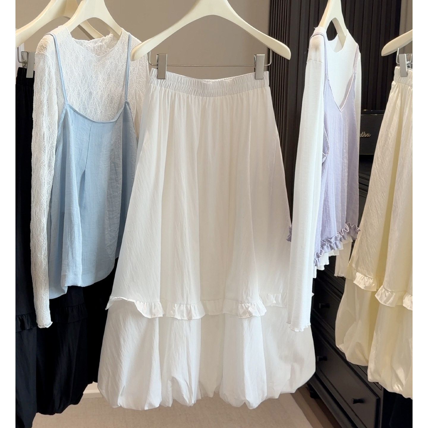 2026春季新款韩版白色木耳边花苞裙女A字中长款半身裙遮胯大摆裙