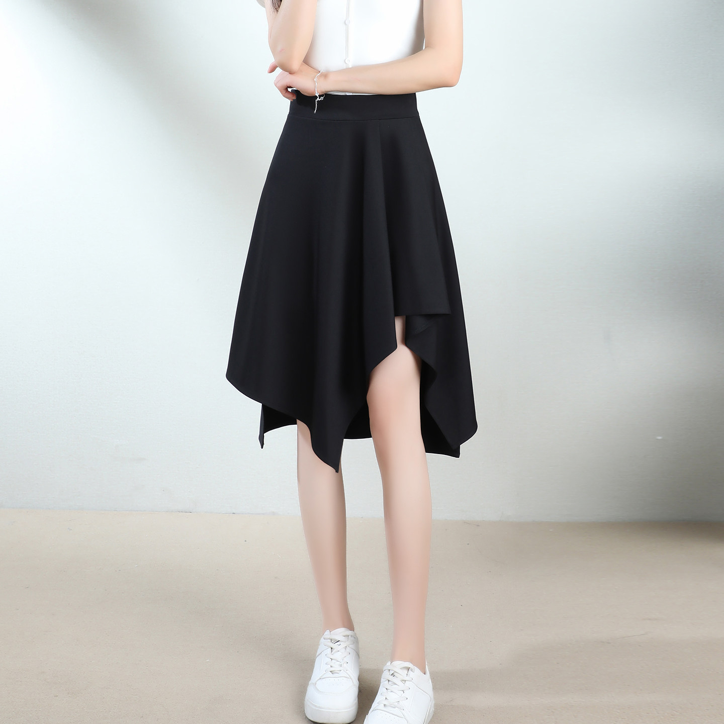 黑色不规则a字半身裙女春秋季松紧高腰显瘦梨形身材中长款半截裙