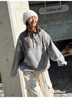 东大门摇粒绒纽扣半开领