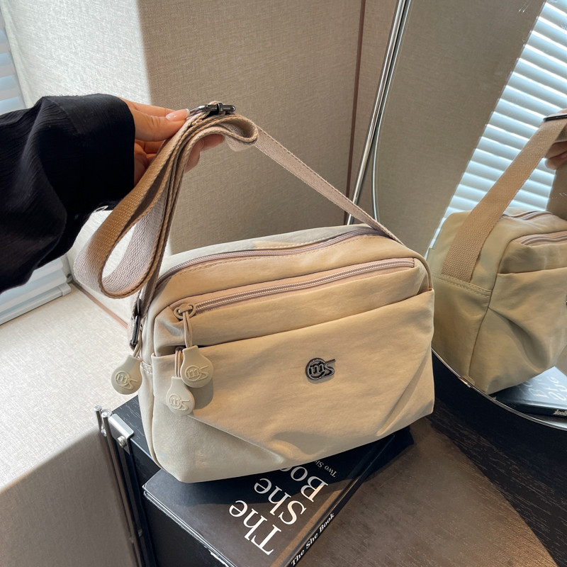 休闲防水女包证件便携旅行轻便收纳单肩包斜挎包化妆包帆布妈妈包