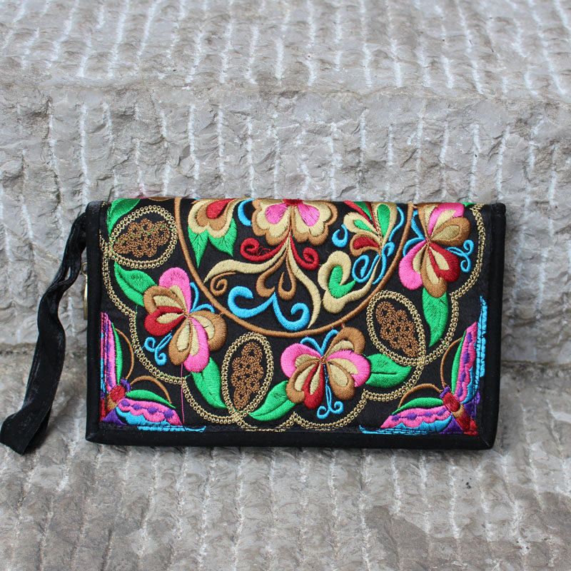 26年新云南民族风刺绣手拿包女黑色植物花卉绣花包布艺拉链零钱包