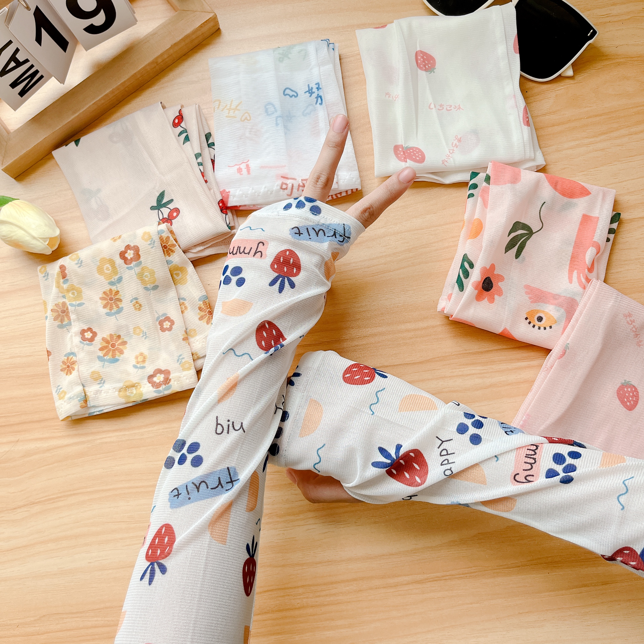 凉爽冰丝宽松防晒袖套女夏季遮阳薄款护臂开车骑行透气护手腕冰袖