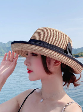 出游优雅女夏卷边蝴蝶结遮阳帽