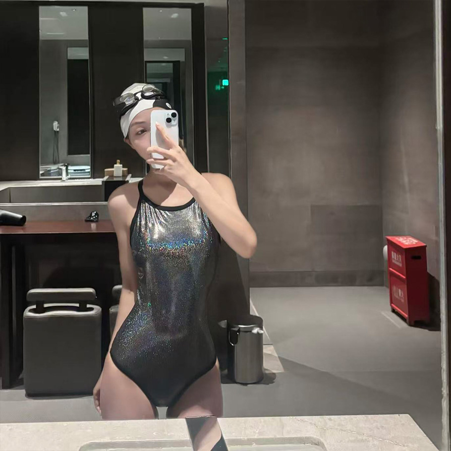 泳衣女新款性感黑色镭射迷彩三角连体竞技专业镂空露背紧身游泳衣