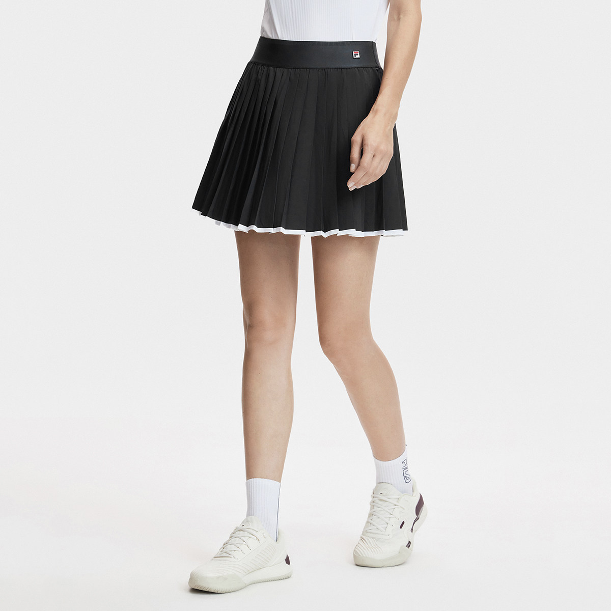 Fila/斐乐夏季新款女子户外时尚休闲运动网球半身裙A11W423303F