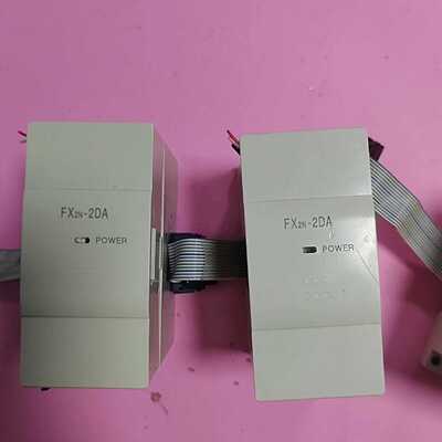 三菱FX2N2DA拆机如下图实物拍摄功能包好盖板议价
