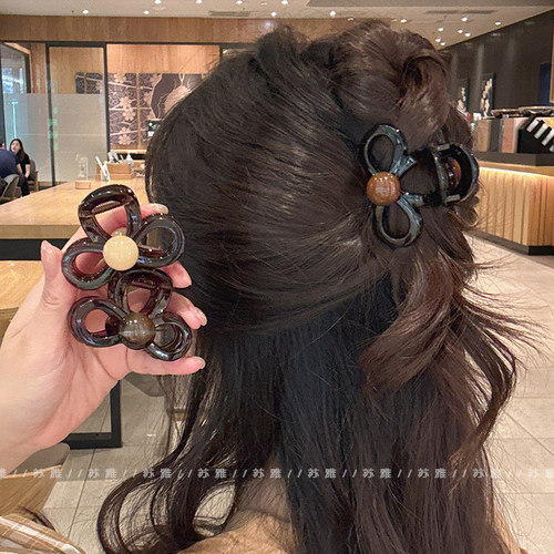 高级感球球蝴蝶结半扎发鲨鱼夹