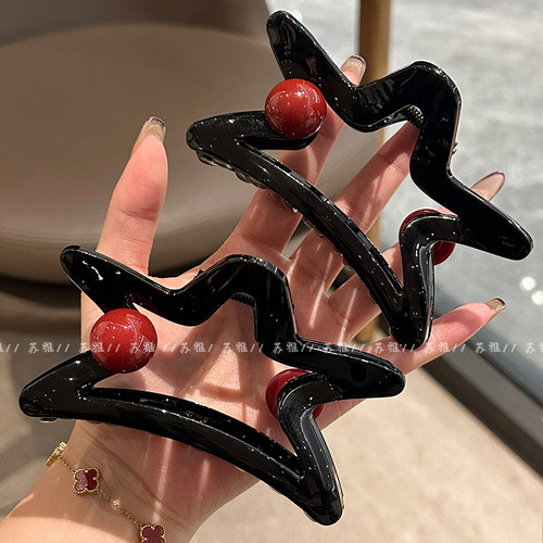 高级感气质五角星镂空盘发鲨鱼夹