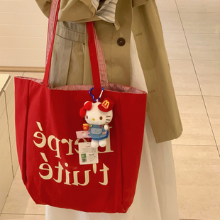 敲出片红色帆布包韩系ins休闲大容量双面背英文字母旅行百搭包包