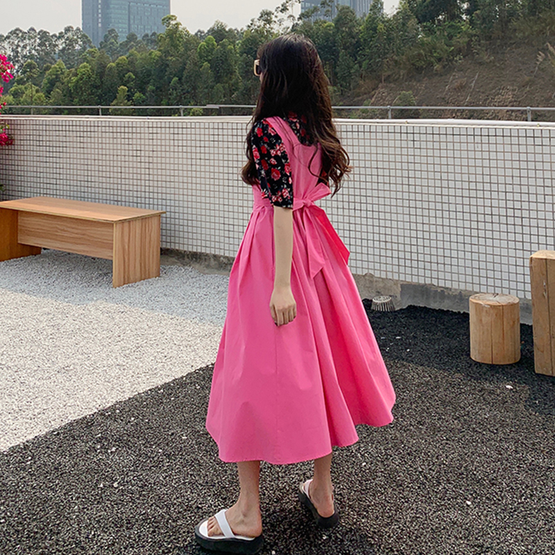 Two piece pink high waist suspender dress with short sleeves and floral shirt