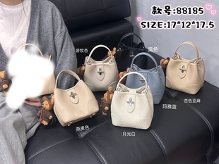 康泰娜女包2026新款时尚荔枝皮小水桶手提大气高级洋气通勤斜挎包