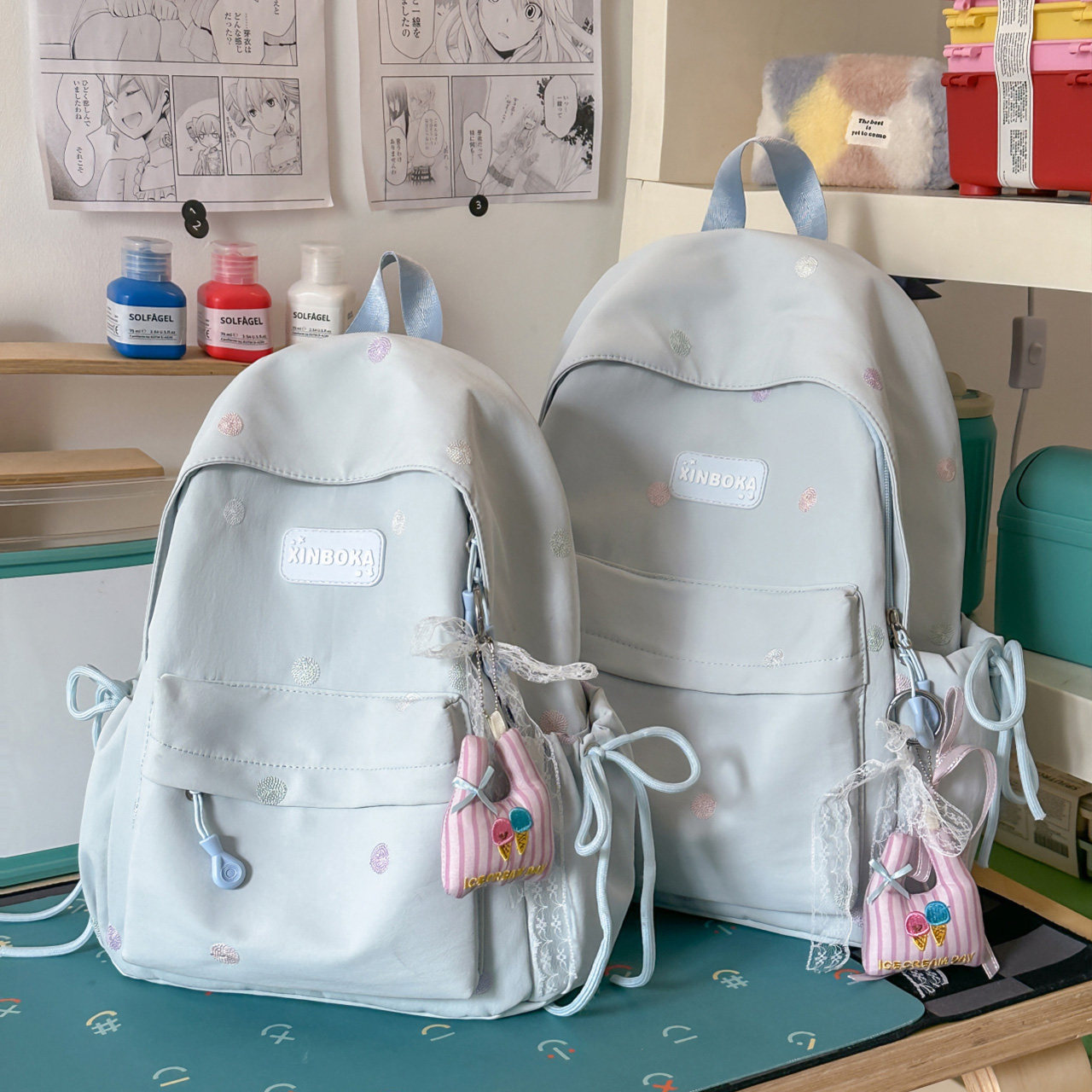 浅蓝波点蕾丝挂件双肩包女大容量学生书包软妹风休闲百搭轻便背包