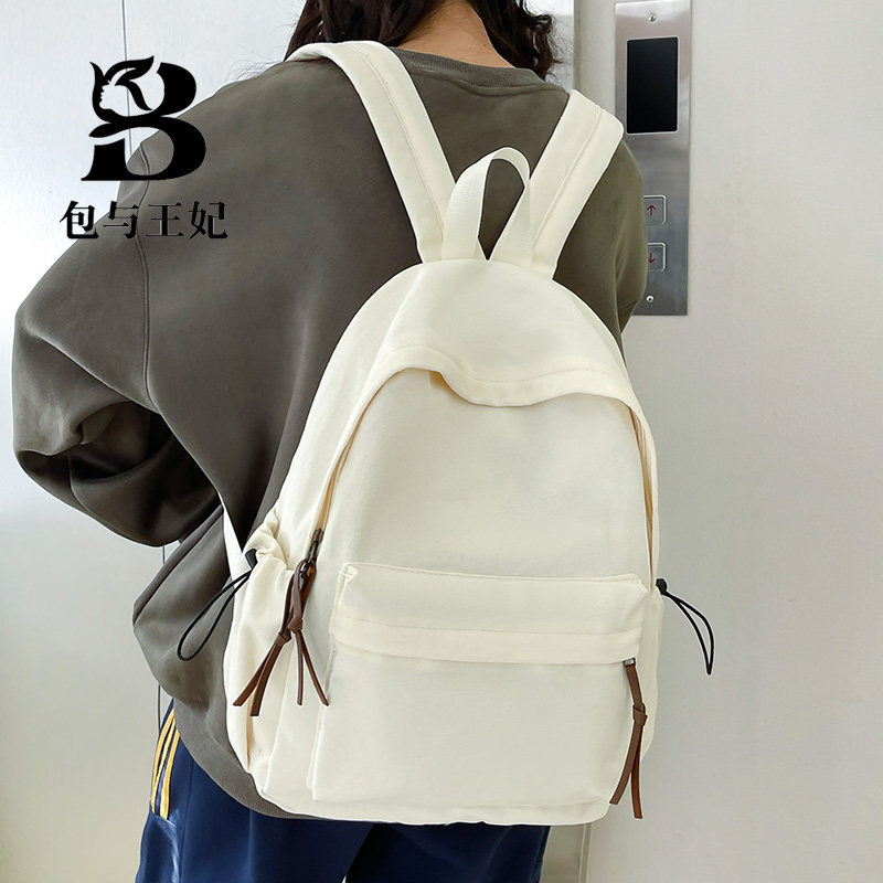 日系帆布书包少女古着感纯色双肩包男高中学生简约大容量旅行背包
