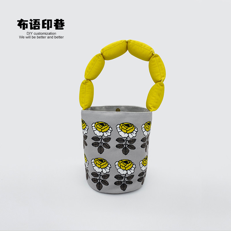 北欧芬兰玫瑰花手提遛弯水桶包包充绒肩带手腕手机收纳袋来图定制