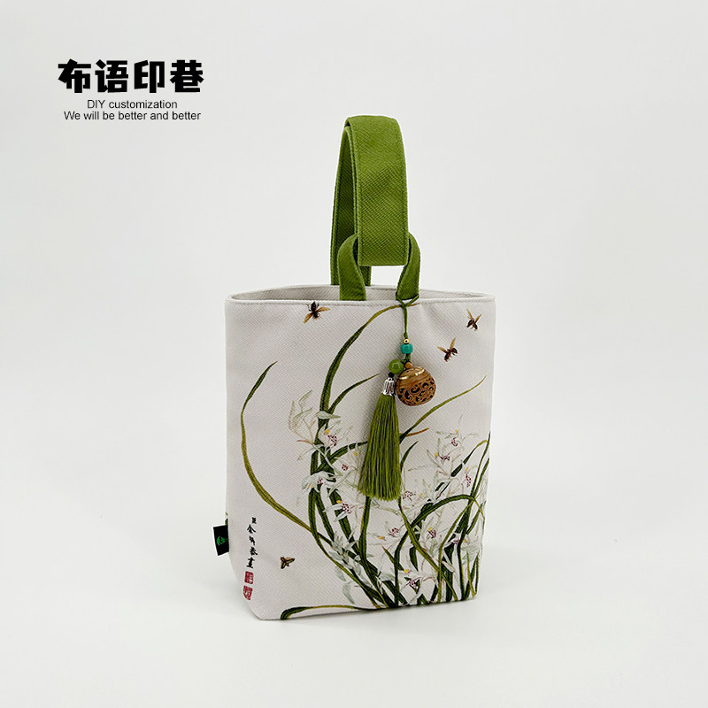 中国风余挚兰花蜜蜂手提遛弯水桶包包小众便携国潮帆布礼品收纳袋