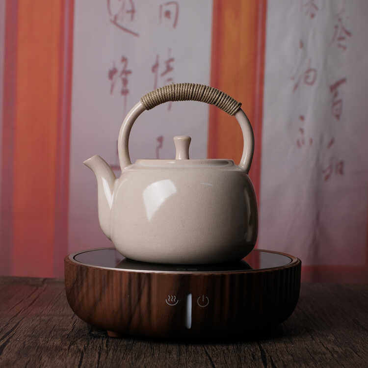 白泥陶瓷围炉煮茶壶家用电陶炉明火烧水壶提梁壶泡茶日式苏打釉