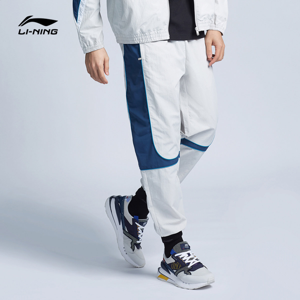 李宁运动长裤男士2021新款运动防泼水宽松秋季束脚运动裤aykr405