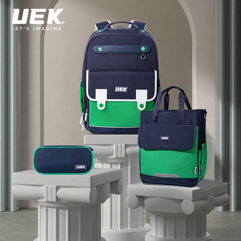 uek小学生书包男1-3-6年级学院风三件套女护脊减负简约儿童双肩包