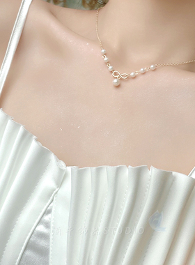 酒午珍珠蝴蝶结项链锁骨链原创