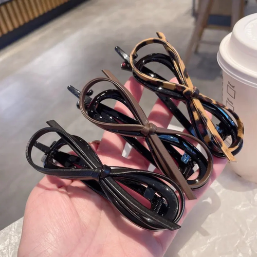 新品气质皮质蝴蝶结扭扭夹女后脑勺盘发高级感一字夹2025年热卖款