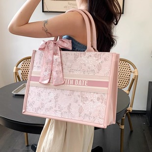 大容量手提通勤托特包女士2025新款夏季流行单肩包休闲粉色帆布包
