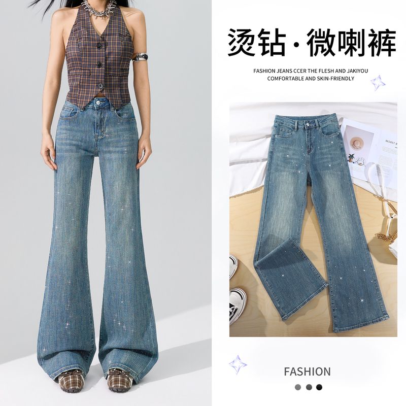 亮闪闪重工艺烫钻微喇叭牛仔裤女图片